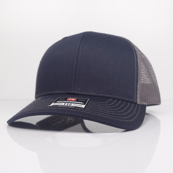 Custom Embroidered Trucker Hat - Richardson 112 option shown in Navy / Charcoal