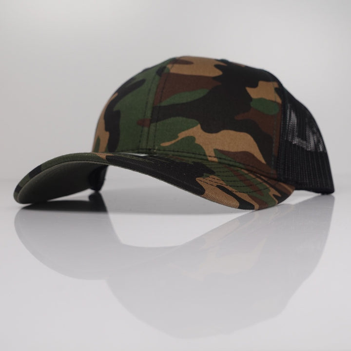 Green camo and black Richardson 112-style custom trucker hat blank side view